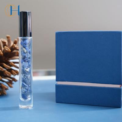 China Personal Care Perfume Luxurious Products Natural Gemstone Infused Essential Oil Roller Glass Bottle For Women for sale