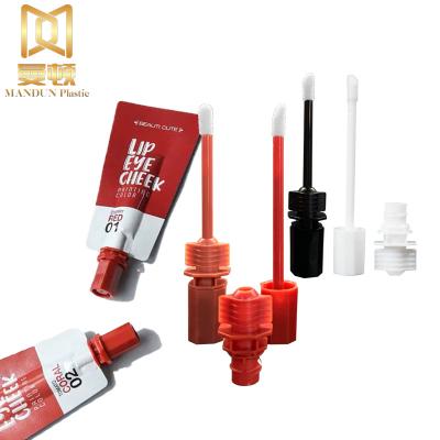 China Non Spill Wholesale Sealed Stem Spout With Lipstick Brush For Makeup Cosmetic Foil Pouch for sale