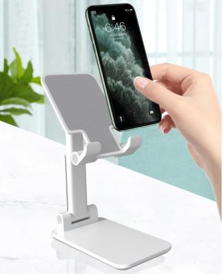 China New Design Adjustable Defended Anti Falling Bracket Adjustable Mobile Phone Holder Mobile Phone Holder ABS Material Phone Holder for sale