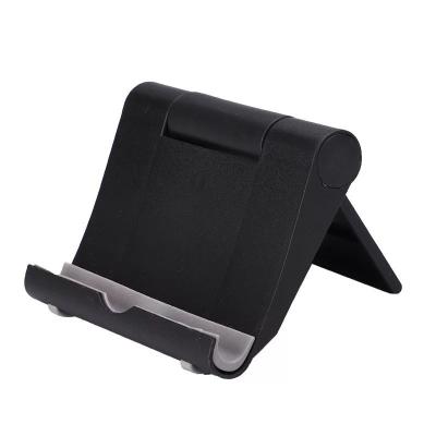 China Easy Install Ready To Ship Colorful Universal ABS Desktop Foldable Phone Stand Lazy Bracket For Phone And Tablet for sale