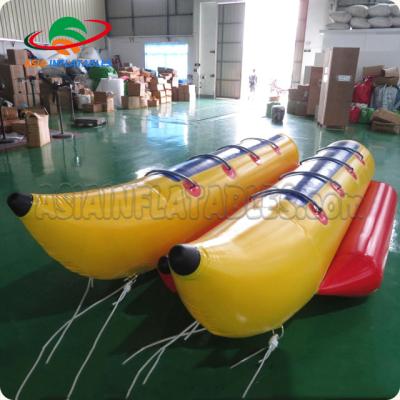 China Amazing Waters Inflatable Water Game Fishing Water Entertainment Fly Banana Boat 0.9mm PVC Pedal Floating Boat For Sale for sale