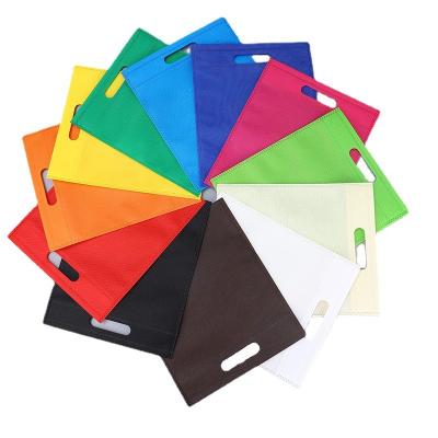 China Hot Sale Colorful Handled Bag D Logo Die Cut Non Woven Custom Cut Bag For Non Woven Fabric for sale