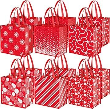 China CHENGBAI 2022 Large Reusable Christmas Party Favor Bags With Handles Reusable Nonwoven Party Bags Christmas Gift Bags for sale