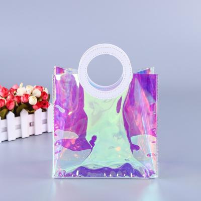 China Holographic color pvc popular fashion handbag waterproof shopping bag shopping bag cosmetic shopping bag customization for sale