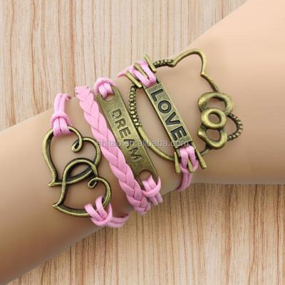 China 2018 bracelet fashion hello kitty bracelet, dream, love, wax bronze double heart strings leather bracelet for sale