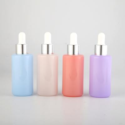 China Personal Care Glass Dropper Bottle For Cosmetics 30ml Round Customized For Serum And Perfume Oil for sale