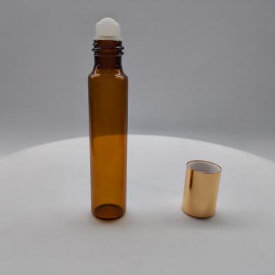 China Personal Care 5ml 10ml 15ml Amber Skin Care Glass Roll On Bottle Perfume Essential Oil Bottle With Rollball Cap for sale