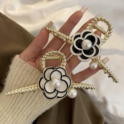 China Hair accessories French Vintage Hairpin Elegant Woman Girls Fashion Thick Hair Accessories Pearl Metal Golden Camellia Flower Hair Claw Clips for sale