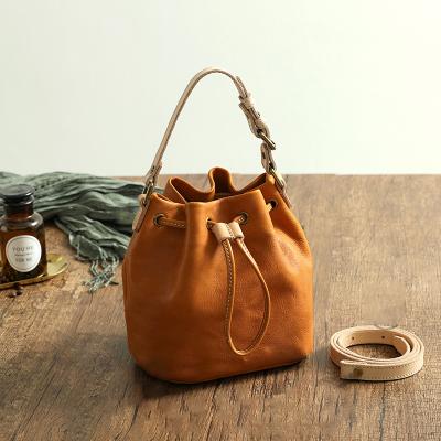 China Latest Vegan Style Dress Fashion Designers Handbags Leather Bucket Bag for sale