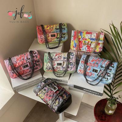 China Custom PU graffiti cross - body bag for women 2021 fashionable cross - anti-theft cross body phone bag - body shoulder bags for sale