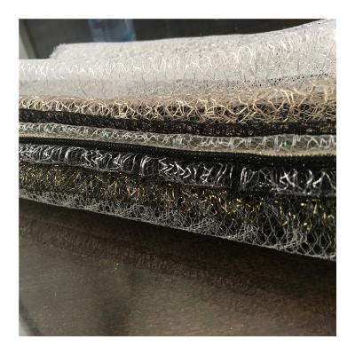 China Flame Retardant Metallic Spider Mesh Fabric of Sliver or Gold Yarn for Flower Decoration for sale