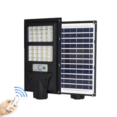 China Garden Street Light 60W Ip66 Outdoor Led Waterproof Garden Wall Solar Panel Energy Saving Lights for sale