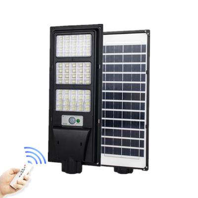 China Garden Motion Sensing 90W Ip66 Waterproof Outdoor All In One Integrated Led Solar Street Light for sale