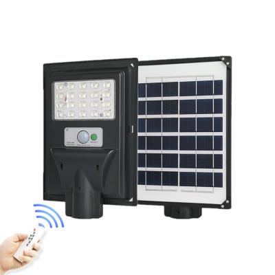 China Outdoor Garden Night Lighting 30W Ip66 Waterproof Remote Control Solar Led Street Light With Motion Sensor for sale