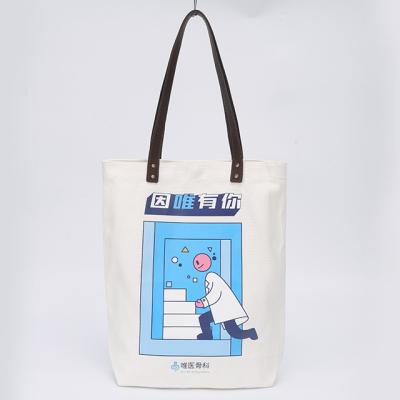 China Eco-Friendly Brand Complimentary Custom Logo Colors Portable Shopping Canvas Bag Zipper And Interior Pocket for sale