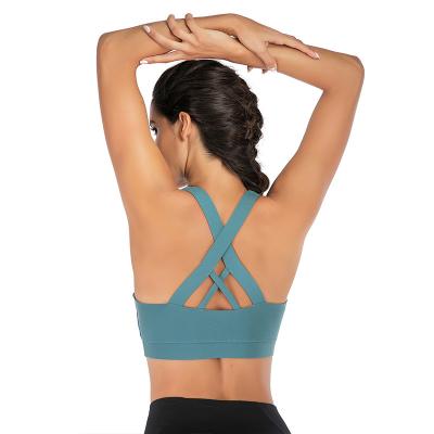 China Fashion Women Breathable Sports Bra Tops Cross Strap Fitness Yoga Tops Beauty Back Yoga Sports Bra Top for sale