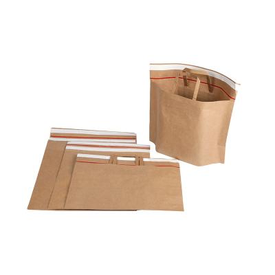 China Recycled Materials Wholesale Washable Logo Handle Bag For Shopping Custom Kraft Paper Bag for sale