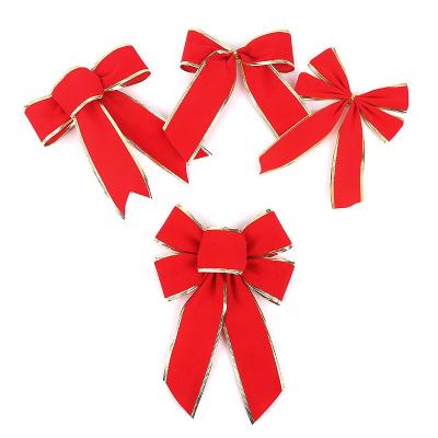 China Hongbin Holiday Decorations Opens Direct Selling Phnom Penh Flocking Christmas Bow Red Festive Celebration Decorative Arch for sale