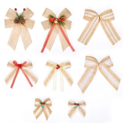 China Hot Sale Exquisite Burlap Bow Decoration Christmas Christamas Decoration Pine Tree Cone Red Fruit for sale