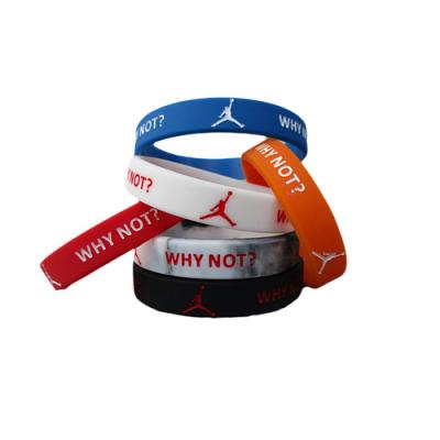 China Durable Custom Eco-Friendly Printed Silicone Logo Rubber Bracelet Wrist Band Wristband With Simple Packing for sale