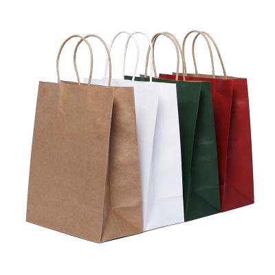 China Recyclable Stock Recycled Kraft Paper Gift Bag With Handle For Shopping for sale