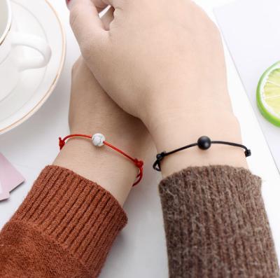 China Matte Lava Stone Bracelet Natural Bead Durable Bracelet Red Line Couple Braided Bracelet For Women for sale