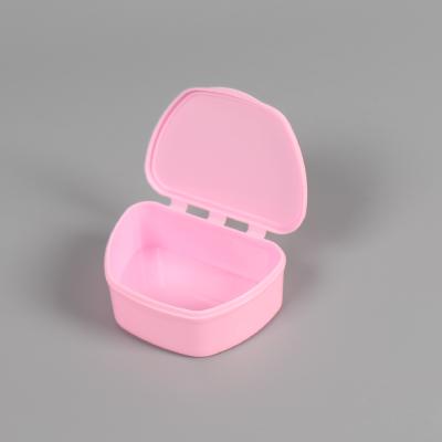 China Plastic Portable Trapezoidal False Teeth Cleaning Orthodontic Retainer Mouthguard Case Dental Storage Denture Box for sale