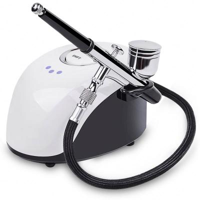 China Skin Tightening BS-103 New Factory Design Oxygen Jet Mini Oxygen Sprayer Manual Airbrush with Mini Cordless Compressor for sale