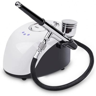 China Mini Portable Facial Oxygen Rechargeable Private Label Spa/Airbrush Compressor Airbrush Makeup Machine for sale