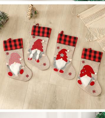 China Sustainable Christmas Stocking Decoration Clothes Santa Socks Christmas Socks Gift New Year Candy Gift Bags for sale