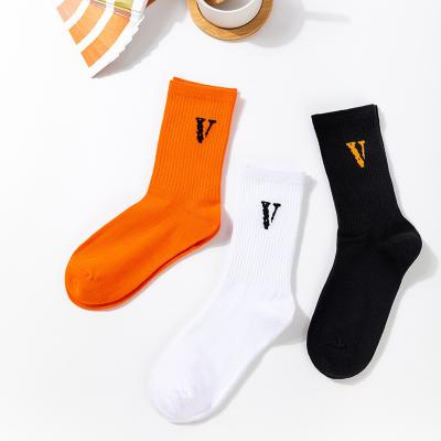 China 2021 new wholesale cheap breathable couple thong candy color thin cotton tube women branded graffiti letter sports socks for sale