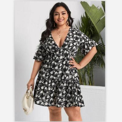 China Wholesale Viable Plus Size Women Shape Short Sleeves Dress Ladies Deep V Neckline Floral Print Illusion Copy Large Casual Dress for sale