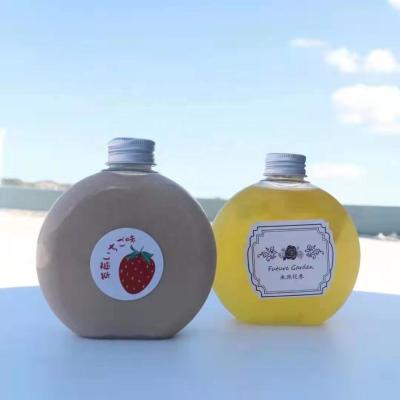 China New Plastic Beverage Design PET Fruit Juice Bottles Customized Logo for sale