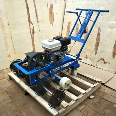 China Easy Push Lawn Hand Operation Machinery Garden Machinery Natural Pasture Grass Transplanting Locating Machine for sale