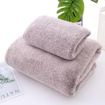 China Compressed Shape Microfiber Spaces Bamboo Charcoal Gym Face Custom Embroidered Sport Towel for sale