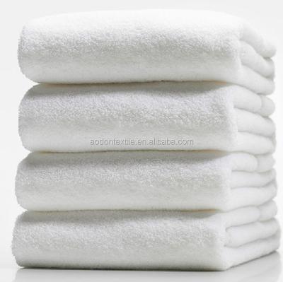 China Custom Compressed 100% Plush Cotton Towel 50*100 Bath Sports Towel for sale