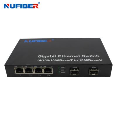 China 10/100/1000M 4-port Rj45+2 SFP port Fiber Optic Ethernet Switch Media converter for sale