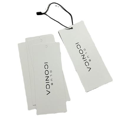 China Sustainable Custom Garment Hang Tags Brand Logo Special Paper Cardboard Eco - Friendly Swing Tags For Garments Customized Clothing Tags for sale