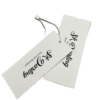 China Customized printable luxury viable brand logo garment swing tag with logo printing garment jewelry paper hang tags for sale