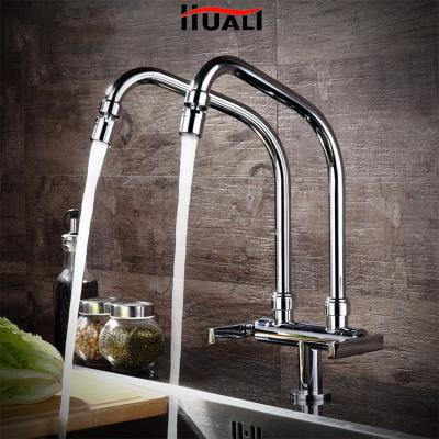 China Brass Faucets Kitchen Faucets Double Hose Double Hose Kitchen Sink Faucet Single Metered Cold Universal Rotating Faucet for sale