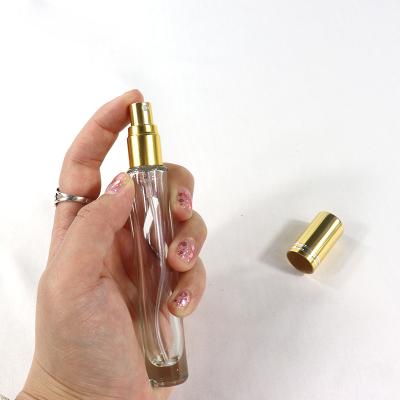 China Cosmetic Travel Round 5ml 10ml 15ml Portable Small Square Essential Oil Glass Perfume Spray Bottle With Gold/Ribbon Cap for sale