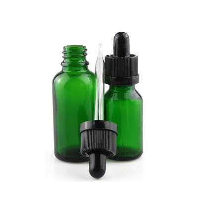 China 1oz 30ml Cosmetic Green Empty Beard Oil Bottle Round 60ml Oil Glass Dropper Bottles Dropper Pipette for sale