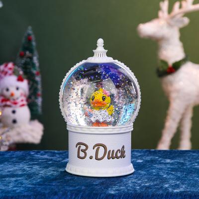 China Custom Snowball Musical Souvenir Duck Water Snowball Snow Globe Yellow China Water Home Decoration Snow Globe Good Quality Resin for sale