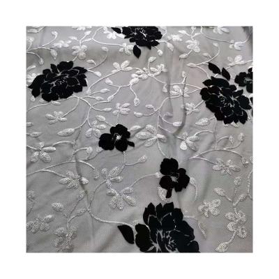 China Breathable Wholesale Large Sequin Embroidery Black Apparel 3mm Flocking Fabric For Decorations for sale