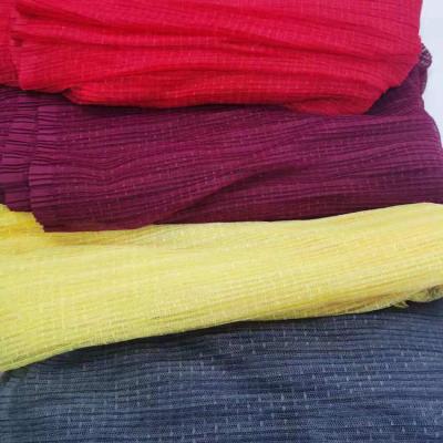 China Factory Price Shrink-Resistant 100% Polyester Dot Mesh Pleated Crinkle Crepe Fabric For Girls Dress for sale