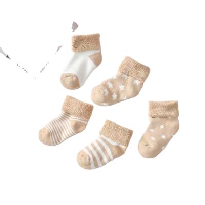 China Autumn Winter breathable thickened baby warm socks disturbed newborn socks for sale