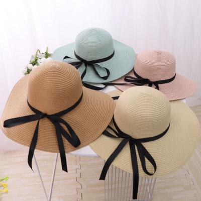 China Foldable Paper Image Beach Straw Summer Hats With Big Brim And Long Ribbon For Female Women for sale