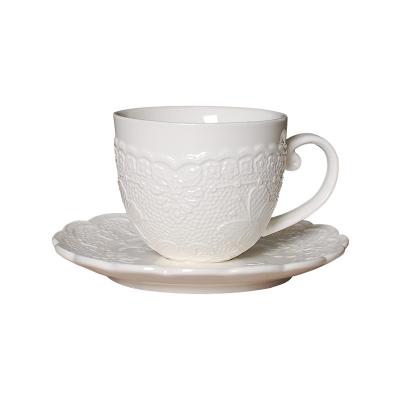 China Sustainable Elegant White Ceramic Coffee Tea Embossing Cup And Saucer Set Bone China Tea Cup And Saucer For Coffee for sale