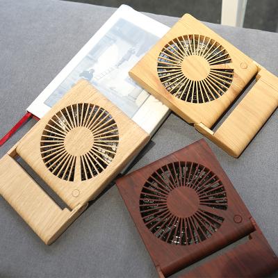 China Cold USB Rechargeable Portable Wood Grain 1200mAh Mini Fan 2019 New Product Fan for sale