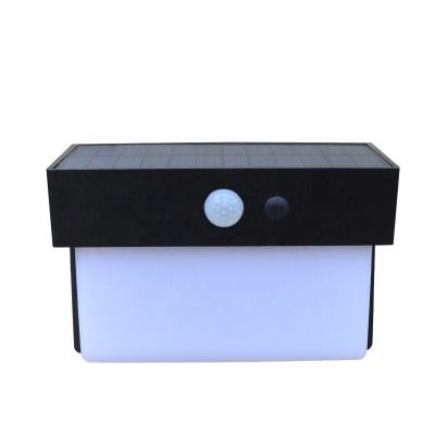 China Newest ABS+PC Outdoor Garden Waterproof Solar Powered 50 LED Lights Path Fence Motion Sensor Wall Lamp for sale